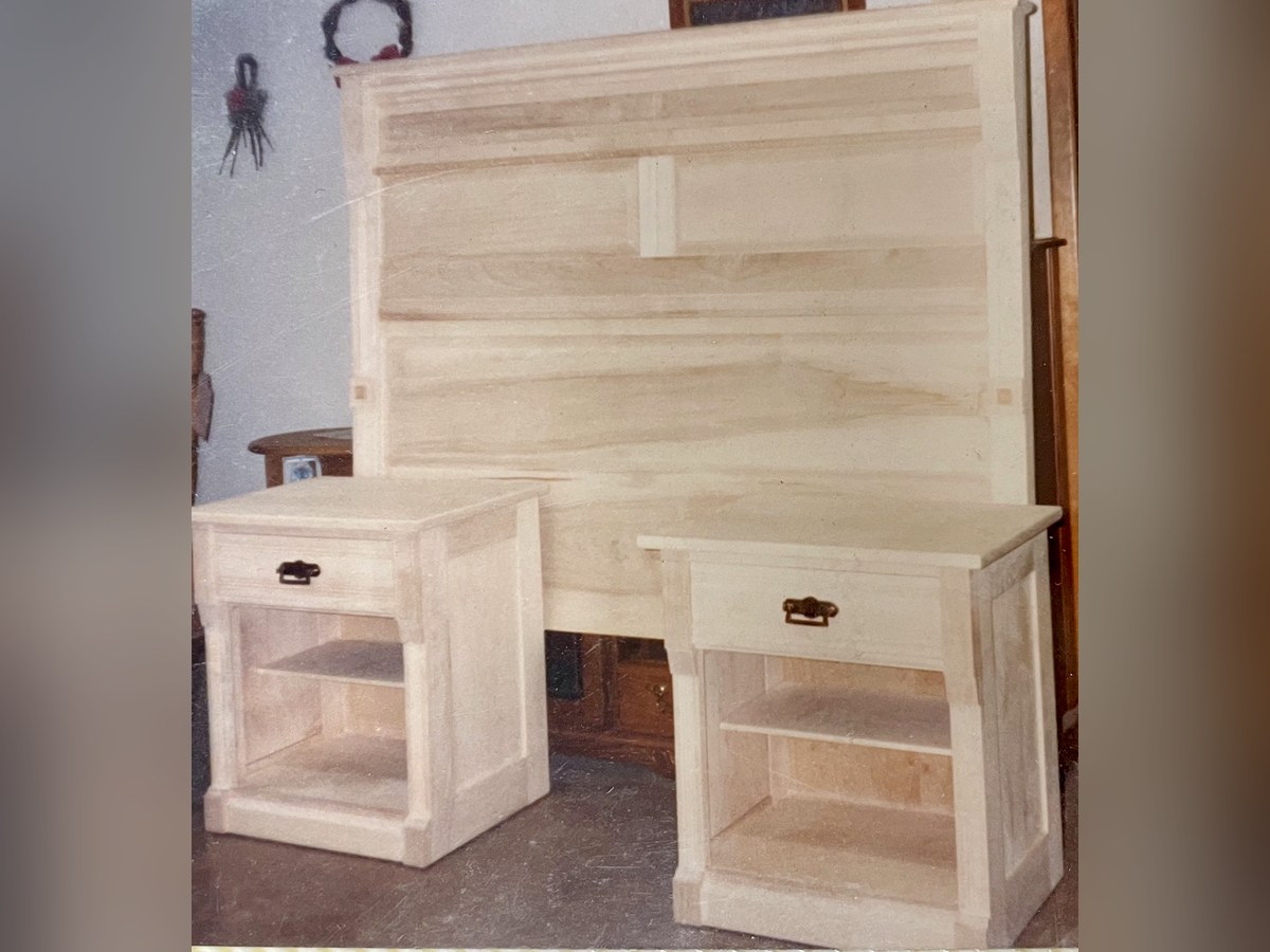 Custom solid wood bedroom set — headboard and two nightstands — hand-built by David Shutt in the Doll Furniture Company shop, shown unfinished before staining